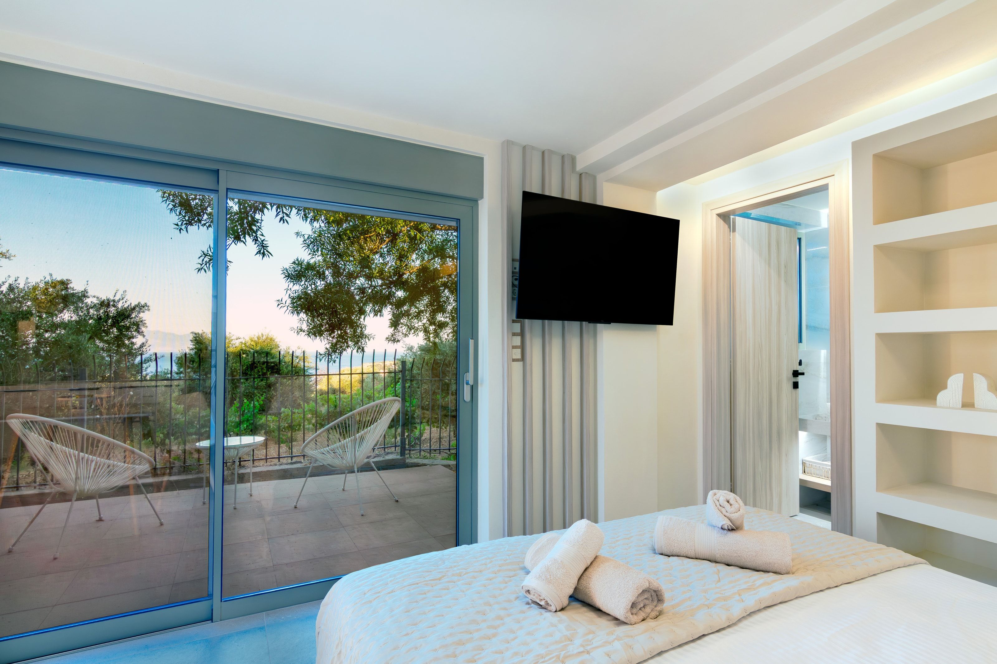 Studio bed and sliding doors to the terrace